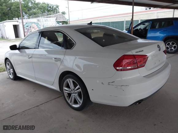 2014 Volkswagen Passat SE w/Sunroof with VIN 1VWBS7A31EC081968, listed as a IAAI auction lot 41963985 with 143,670 mi miles. Bid and sale history available at carsss.com. Image 3.