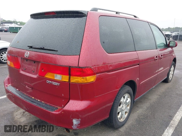 2003 Honda Odyssey EX-L with VIN 5FNRL18993B009180, listed as a IAAI auction lot 42224572 with 187,781 mi miles and . Bid and sale history available at DreamBid. Image 4.