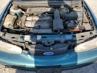 1997 Ford Contour z VIN 3FALP6536VM113346, wystawiony jako Copart lot #70036024 z przebiegiem 115 084 mil mil oraz Tytuł czysty. Historia ofert i sprzedaży dostępna na DreamBid. Obrazek 11.