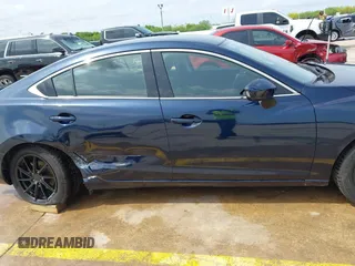 2015 Mazda 6 i Sport with VIN JM1GJ1U52F1201571, listed as a IAAI auction lot 42096344 with 88,290 mi miles and . Bid and sale history available at DreamBid. Image 13.