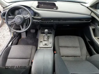 2023 Mazda CX-30 S with VIN 3MVDMBAM6PM549095, listed as a Copart auction lot 53027665 with 53,804 mi miles and Salvage title. Bid and sale history available at DreamBid. Image 8.