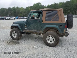 1999 Jeep Wrangler Sahara with VIN 1J4FY49S0XP489462, listed as a Copart auction lot 54750405 with 134,134 mi miles and Non repairable. Bid and sale history available at DreamBid. Image 2.