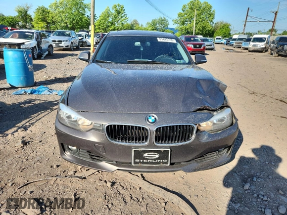 2013 BMW 3 Series 328i xDrive z VIN WBA3B5G53DNS02777, wystawiony jako Copart lot #61685255 z przebiegiem 187 559 mil mil oraz Szkoda całkowita • Salvage title. Historia ofert i sprzedaży dostępna na DreamBid. Obrazek 5.