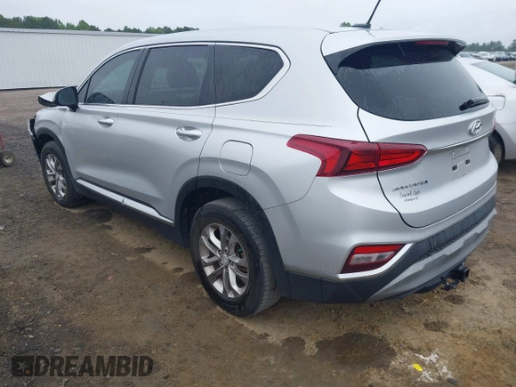 2019 Hyundai Santa Fe SE z VIN 5NMS23AD4KH130517, wystawiony jako IAAI lot #42324854 z przebiegiem 76 963 mil mil oraz . Historia ofert i sprzedaży dostępna na DreamBid. Obrazek 3.