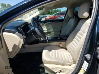 2014 Ford Fusion SE with VIN 3FA6P0H76ER115187, listed as a Copart auction lot 57703364 with 121,675 mi miles and Salvage Title. Bid and sale history available at DreamBid. Image 7.