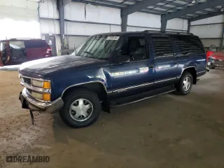 1999 Chevrolet Suburban with VIN 3GNEC16R5XG218523, listed as a Copart auction lot 72568494 with 297,020 mi miles and Salvage Title. Bid and sale history available at carsss.com. Image 1.