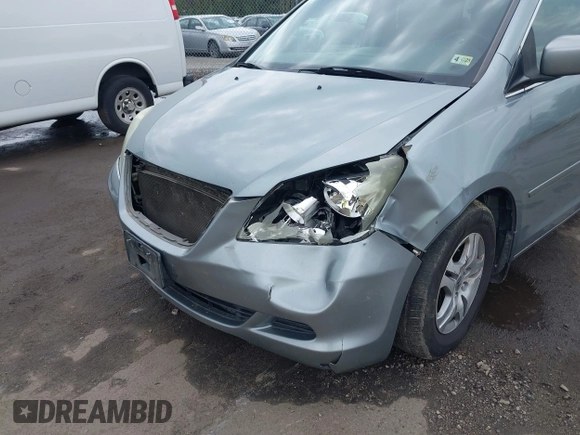 2007 Honda Odyssey EX with VIN 5FNRL38487B018720, listed as a IAAI auction lot 42041940 with 388,509 mi miles and . Bid and sale history available at DreamBid. Image 6.