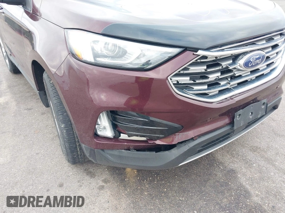 2020 Ford Edge Titanium z VIN 2FMPK4K91LBB56297, wystawiony jako IAAI lot #41938896 z przebiegiem 79 875 mil mil oraz . Historia ofert i sprzedaży dostępna na DreamBid. Obrazek 17.
