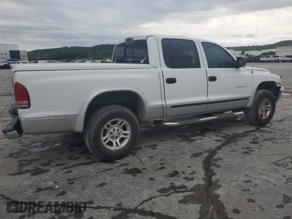 2002 Dodge Dakota SLT z VIN 1B7HG48N22S614075, wystawiony jako Copart lot #57783905 z przebiegiem 247 769 mil mil oraz Szkoda całkowita • Salvage title. Historia ofert i sprzedaży dostępna na DreamBid. Obrazek 3.