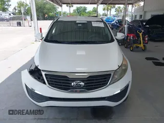 2013 Kia Sportage LX z VIN KNDPB3A2XD7521010, wystawiony jako IAAI lot #42297975 z przebiegiem 134 826 mil mil oraz . Historia ofert i sprzedaży dostępna na DreamBid. Obrazek 13.