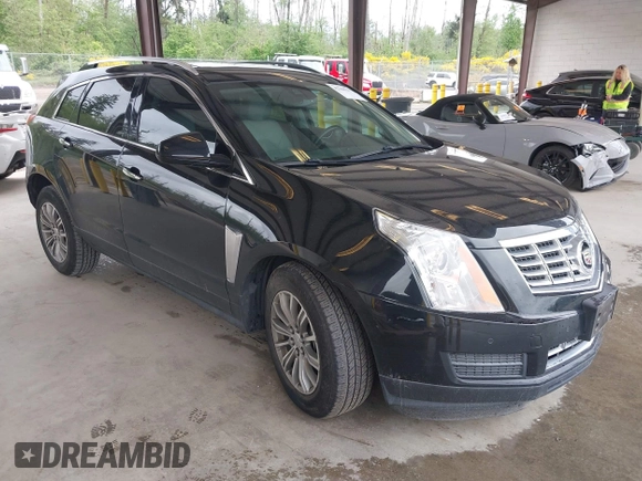 2014 Cadillac SRX Luxury Collection z VIN 3GYFNEE36ES677883, wystawiony jako IAAI lot #42260861 z przebiegiem 51 730 mil mil oraz . Historia ofert i sprzedaży dostępna na DreamBid. Obrazek 1.