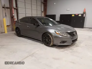 2018 Nissan Altima 2.5 SR with VIN 1N4AL3AP1JC203798, listed as a IAAI auction lot 41853789 with 77,875 mi miles. Bid and sale history available at carsss.com. Image 1.