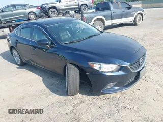 2015 Mazda 6 i Touring with VIN JM1GJ1V57F1183910, listed as a IAAI auction lot 42158716 with 234,765 mi miles. Bid and sale history available at carsss.com. Image 1.