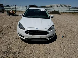 2018 Ford Focus SE with VIN 1FADP3FE0JL227146, listed as a Copart auction lot 56151985 with 124,517 mi miles and Salvage title. Bid and sale history available at DreamBid. Image 13.