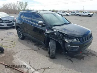 2020 Jeep Compass Trailhawk with VIN 3C4NJDDB7LT129673, listed as a IAAI auction lot 41811055 with 30,106 mi miles and . Bid and sale history available at carsss.com. Image 1.