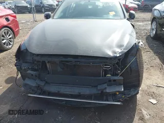 2015 Infiniti Q50 Premium with VIN JN1BV7AR1FM417499, listed as a IAAI auction lot 42063460 with 117,210 mi miles. Bid and sale history available at carsss.com. Image 13.