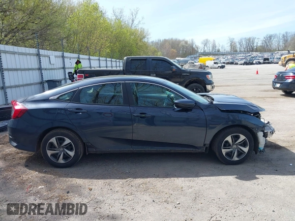2021 Honda Civic LX z VIN 19XFC2F65ME000324, wystawiony jako IAAI lot #42137375 z przebiegiem 78 473 mil mil oraz . Historia ofert i sprzedaży dostępna na DreamBid. Obrazek 13.