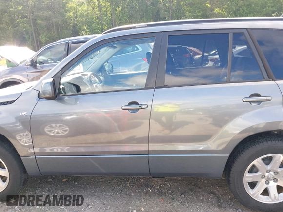 2006 Suzuki Grand Vitara Luxury z VIN JS3TE947864103082, wystawiony jako IAAI lot #42470917 z przebiegiem 155 702 mil mil oraz . Historia ofert i sprzedaży dostępna na DreamBid. Obrazek 15.