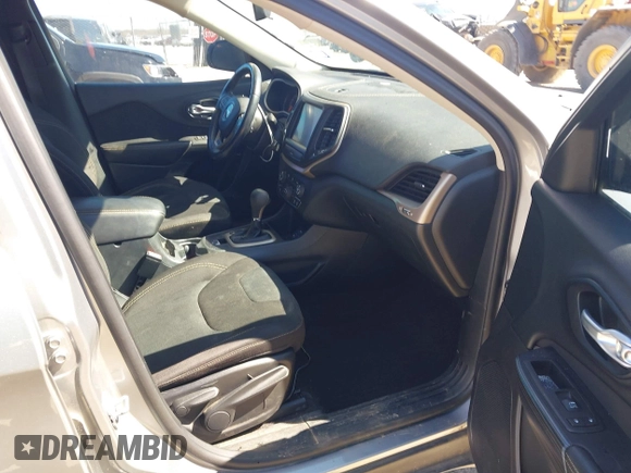 2016 Jeep Cherokee 75th Anniversary with VIN 1C4PJLCB1GW217638, listed as a IAAI auction lot 41689623 with 124,630 mi miles and . Bid and sale history available at DreamBid. Image 5.