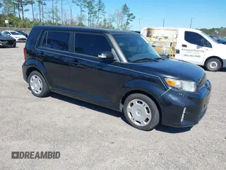 2013 Scion xB with VIN JTLZE4FE8DJ033982, listed as a IAAI auction lot 41820204 with 155,418 mi miles. Bid and sale history available at carsss.com. Image 1.