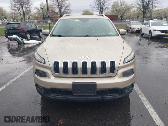 2014 Jeep Cherokee Latitude with VIN 1C4PJLCB8EW191911, listed as a IAAI auction lot 41956728 with 123,643 mi miles. Bid and sale history available at carsss.com. Image 12.