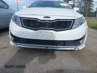 2012 Kia Optima Hybrid with VIN KNAGM4AD9C5011658, listed as a IAAI auction lot 42197129 with 142,977 mi miles. Bid and sale history available at carsss.com. Image 6.