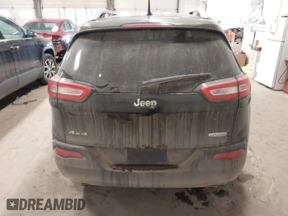 2014 Jeep Cherokee Latitude z VIN 1C4PJMCS0EW321380, wystawiony jako IAAI lot #41597508 z przebiegiem 173 991 mil mil oraz . Historia ofert i sprzedaży dostępna na DreamBid. Obrazek 16.