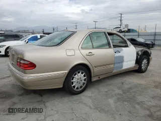 2001 Mercedes-Benz E-Class with VIN WDBJF65J01B251208, listed as a Copart auction lot 47550795 with 228,392 mi miles and Salvage Title. Bid and sale history available at carsss.com. Image 3.
