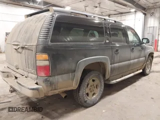 2004 Chevrolet Suburban Z71 with VIN 3GNFK16Z94G148074, listed as a IAAI auction lot 41342796 with 216,670 mi miles. Bid and sale history available at carsss.com. Image 4.