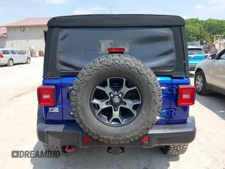 2018 Jeep Wrangler Unlimited Rubicon with VIN 1C4HJXFG8JW184793, listed as a IAAI auction lot 42429098 with 86,580 mi miles and . Bid and sale history available at DreamBid. Image 16.