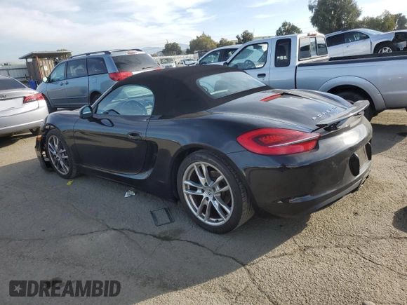 2014 Porsche Boxster with VIN WP0CA2A84ES121667, listed as a Copart auction lot 87510945 with 62,689 mi miles and Salvage title. Bid and sale history available at DreamBid. Image 2.