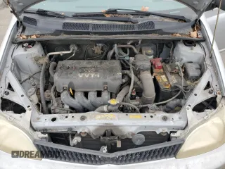 2002 Toyota ECHO z VIN JTDAT123820226685, wystawiony jako Copart lot #72036334 z przebiegiem 148 060 mil mil oraz Szkoda całkowita • Salvage title. Historia ofert i sprzedaży dostępna na DreamBid. Obrazek 11.