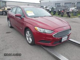 2018 Ford Fusion SE z VIN 3FA6P0LU0JR235235, wystawiony jako IAAI lot #41885587 z przebiegiem 100 879 mil mil oraz . Historia ofert i sprzedaży dostępna na DreamBid. Obrazek 1.