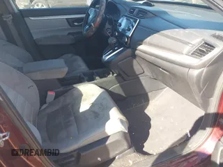 2019 Honda CR-V LX with VIN 2HKRW5H30KH414385, listed as a IAAI auction lot 41869188 with 91,473 mi miles and . Bid and sale history available at DreamBid. Image 5.