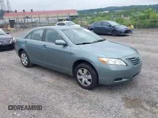 2007 Toyota Camry CE z VIN 4T1BE46K67U709282, wystawiony jako IAAI lot #42534594 z przebiegiem 156 794 mil mil oraz . Historia ofert i sprzedaży dostępna na DreamBid. Obrazek 1.