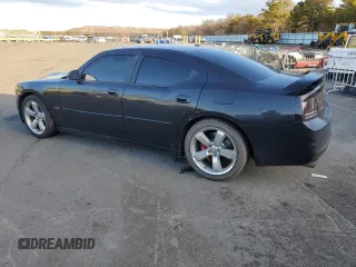 2006 Dodge Charger SRT-8 with VIN 2B3LA73W36H369475, listed as a Copart auction lot 43774705 with 130,495 mi miles and Salvage Title. Bid and sale history available at DreamBid. Image 2.