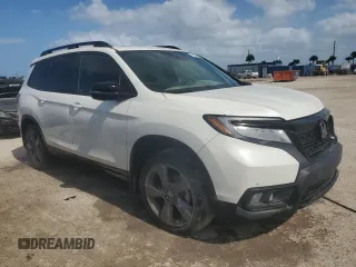 2021 Honda Passport Touring z VIN 5FNYF7H93MB014916, wystawiony jako Copart lot #75050454 z przebiegiem 28 364 mil mil oraz Nie do naprawy • Non repairable. Historia ofert i sprzedaży dostępna na DreamBid. Obrazek 4.
