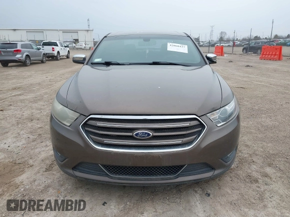 2015 Ford Taurus Limited with VIN 1FAHP2J84FG110702, listed as a IAAI auction lot 42060437 with 208,012 mi miles. Bid and sale history available at carsss.com. Image 12.