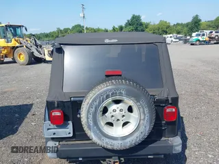 2003 Jeep Wrangler Sahara with VIN 1J4FA59S23P328003, listed as a IAAI auction lot 42833276 with 271,741 mi miles and . Bid and sale history available at DreamBid. Image 16.