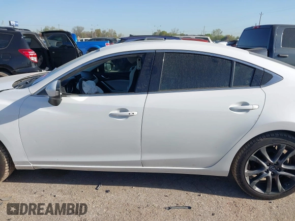 2016 Mazda Mazda6 i Grand Touring with VIN JM1GJ1W54G1456737, listed as a IAAI auction lot 41841001 with 114,870 mi miles. Bid and sale history available at carsss.com. Image 15.