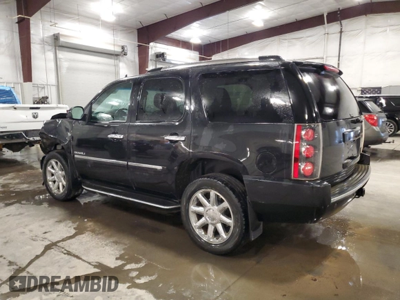 2013 GMC Yukon Denali with VIN 1GKS2EEF0DR283857, listed as a Copart auction lot 46505705 with 148,428 mi miles and Salvage Title. Bid and sale history available at carsss.com. Image 2.