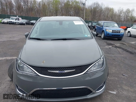 2020 Chrysler Pacifica Touring with VIN 2C4RC1FG3LR245765, listed as a IAAI auction lot 42069689 with 40,869 mi miles and . Bid and sale history available at DreamBid. Image 12.
