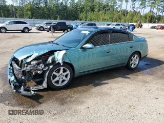 2002 Nissan Altima SE with VIN 1N4BL11DX2C146405, listed as a Copart auction lot 74374154 with 0 mi miles and Salvage Title. Bid and sale history available at carsss.com. Image 1.