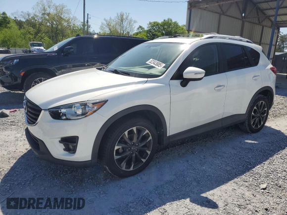 2016 Mazda CX-5 Grand Touring with VIN JM3KE4DY0G0819528, listed as a Copart auction lot 52343885 with 77,340 mi miles and Clean Title. Bid and sale history available at DreamBid. Image 1.