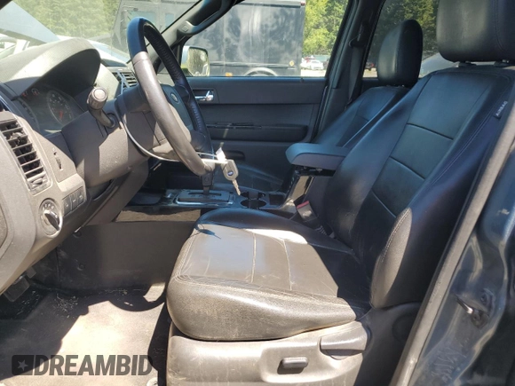 2012 Ford Escape Limited with VIN 1FMCU9EG3CKA51976, listed as a Copart auction lot 65721855 with 142,796 mi miles and Salvage title. Bid and sale history available at DreamBid. Image 7.