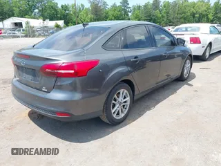 2018 Ford Focus SE with VIN 1FADP3FE2JL227679, listed as a IAAI auction lot 42296608 with 128,269 mi miles and . Bid and sale history available at DreamBid. Image 4.