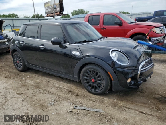 2019 MINI Hardtop 4 Door Cooper S с VIN WMWXU3C58K2H87220, выставлен на аукционе Copart как лот 55775665 с пробегом 54 404 миль миль и Списание • Salvage title. История ставок и продаж доступна на DreamBid. Изображение 4.