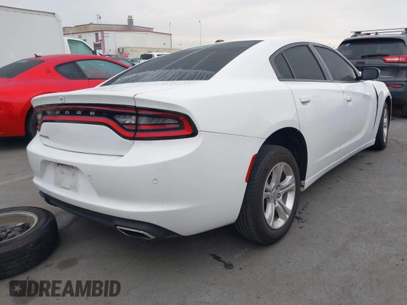 2021 Dodge Charger SXT with VIN 2C3CDXBGXMH514870, listed as a IAAI auction lot 41725294 with 72,962 mi miles. Bid and sale history available at carsss.com. Image 4.