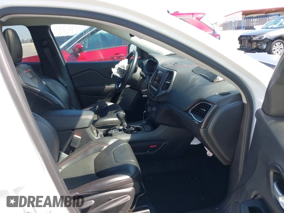 2021 Jeep Cherokee Trailhawk with VIN 1C4PJMBX1MD145169, listed as a IAAI auction lot 42340464 with 50,925 mi miles and . Bid and sale history available at DreamBid. Image 5.