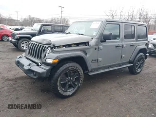 2021 Jeep Wrangler Unlimited Sport S with VIN 1C4HJXDG5MW614688, listed as a IAAI auction lot 41678964 with 89,309 mi miles. Bid and sale history available at carsss.com. Image 21.